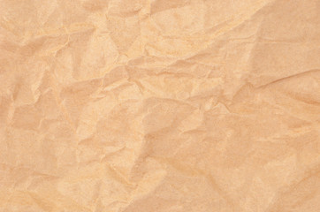 Wrinkled packaging paper background, close up, DOF