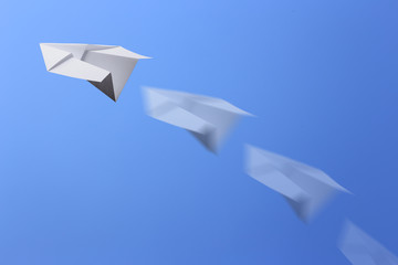 Fototapeta na wymiar Paper Plane Flying