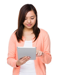 Young Woman use of the tablet pc