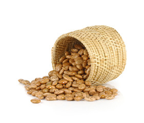  pinto beans spilled from basket isolated on white background