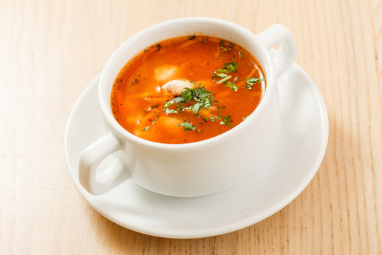 tomato soup with vegetables and meat