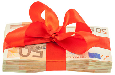 liasse de billets et ruban rouge, cadeau sur fond blanc 