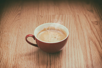 Cup of coffee in a warm atmosphere.