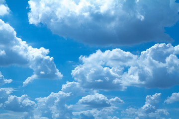 Naklejka na ściany i meble A cloud on the blue sky