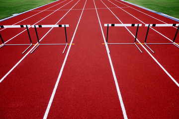  track field for athlete running with obstacle