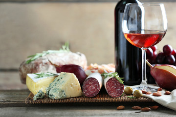 Still life with various types of Italian food and wine