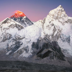 The peak of the highest mountain in the world - Mt. Everest at the sunset.  - 94255649
