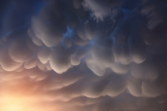 Mammatus clouds are pouch-like cloud structures. It’s a strange and very rare formations of clouds in sinking air.