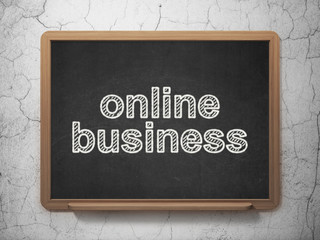Finance concept: Online Business on chalkboard background