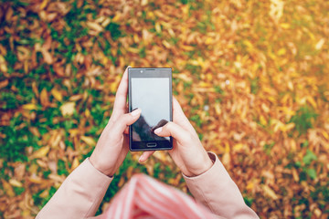 Young woman text messaging