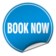 book now round blue sticker isolated on white