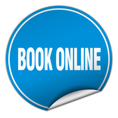 book online round blue sticker isolated on white