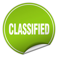 classified round green sticker isolated on white