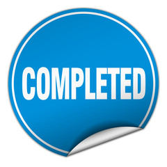 completed round blue sticker isolated on white