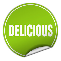 delicious round green sticker isolated on white