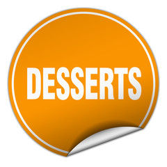 desserts round orange sticker isolated on white