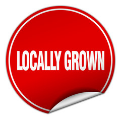 locally grown round red sticker isolated on white