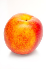 Fototapeta na wymiar Two-colored orange and red peach isolated on white background. Clipping path included