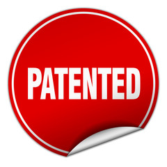 patented round red sticker isolated on white