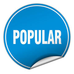 popular round blue sticker isolated on white