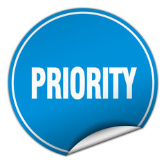 priority round blue sticker isolated on white