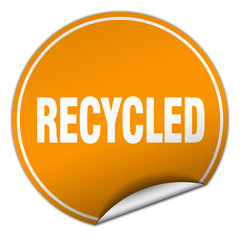 recycled round orange sticker isolated on white