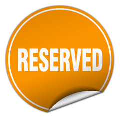 reserved round orange sticker isolated on white