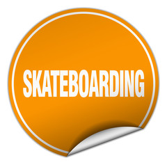 skateboarding round orange sticker isolated on white