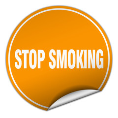 stop smoking round orange sticker isolated on white