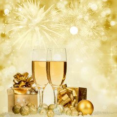 Champagne over fireworks and sparkling holiday lights