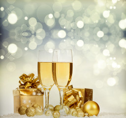 Champagne over fireworks and sparkling holiday lights