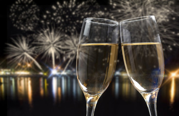 Celebrating New Year with champagne and fireworks