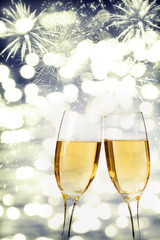 Celebrating New Year with champagne and fireworks