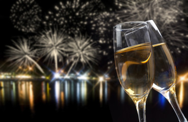 Celebrating New Year with champagne and fireworks