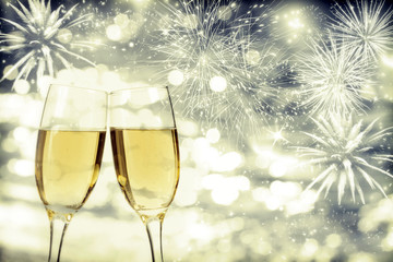 Celebrating New Year with champagne and fireworks