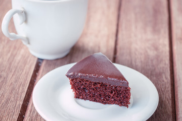 chocolate cake with cup of coffee