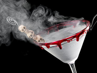 Bloody Halloween skull martini with smoke, close up