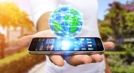 Businessman surfing on internet with modern mobile phone