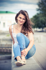 Portrait of a beautiful european woman smiling outdoors