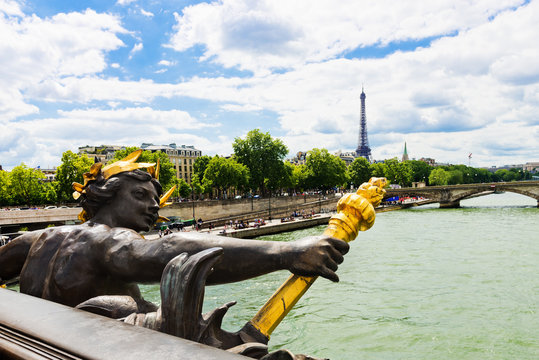 View on Seine River and Eiffel Tower from Alexander III bridge (