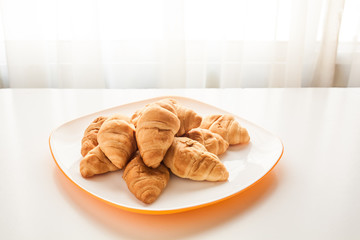 Croissants in a white plate