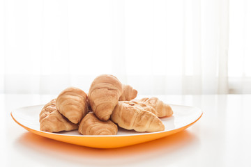Croissants in a white plate