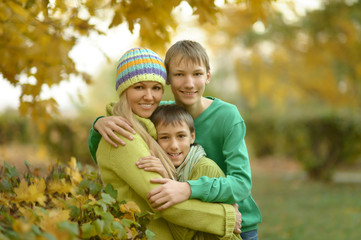 Fototapeta premium Mother and sons in park