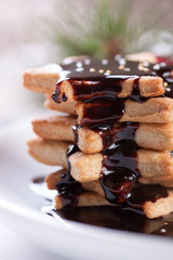 Homemade christmas cookies on a white plate ..