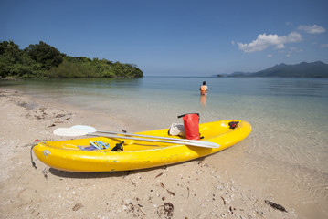 Fototapeta na wymiar Kayak on a white sandy beach of Koh Man Nai, Trat, Thailand