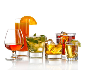 Various cocktails, drinks and shots over white background