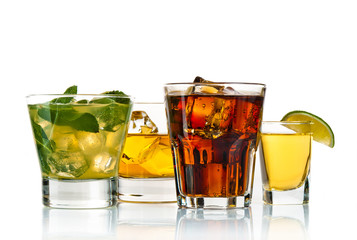 Various cocktails, drinks and shots over white background