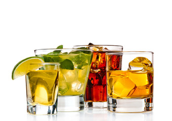 Various cocktails, drinks and shots over white background