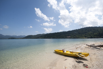 Fototapeta premium Kayak on a white sandy beach of Koh Man Nai, Trat, Thailand