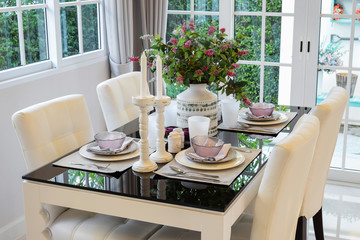 dining table and comfortable chairs in vintage style with elegan